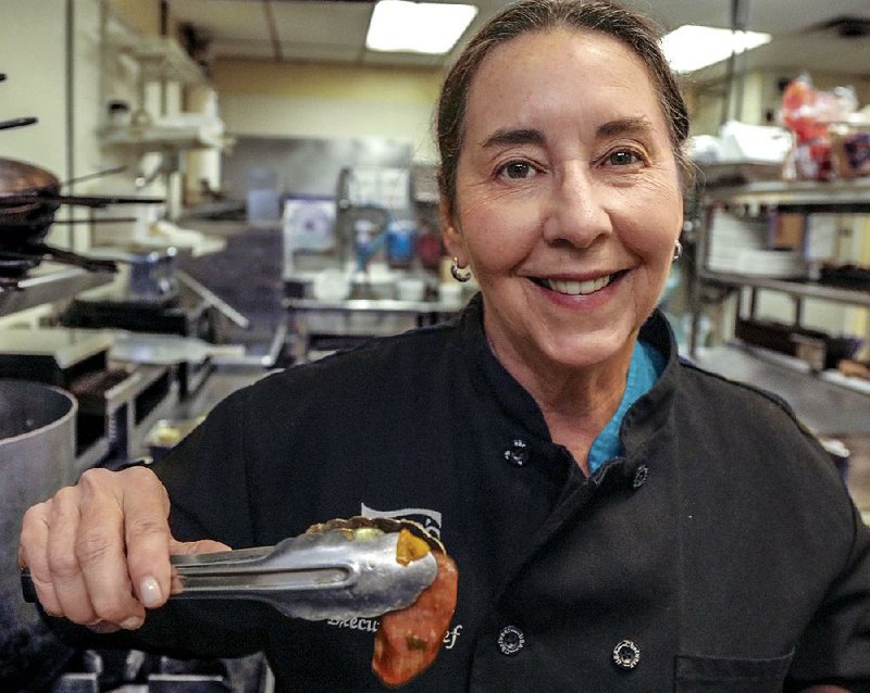 Capi Peck, executive chef and owner of Trio’s restaurant, knows her way around a kitchen. She is us- ing her professional skills to teach low-income families how to serve healthful meals and save money.