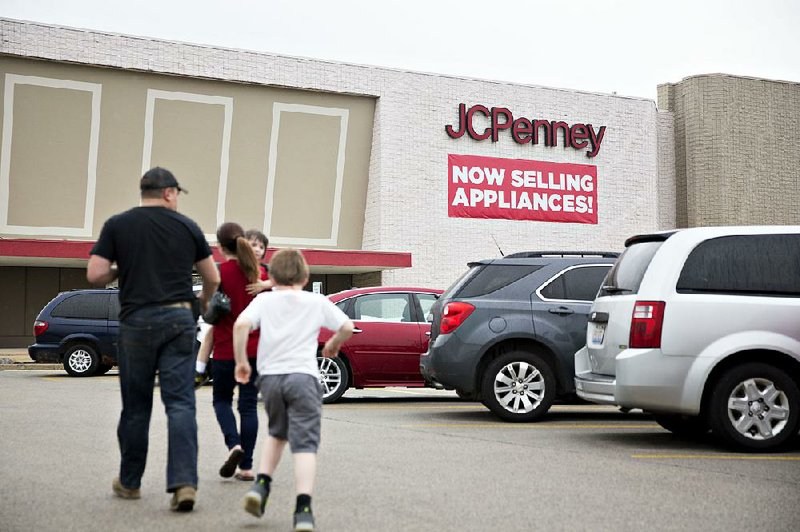 J.C. Penney stores like this one in Peoria, Ill., offered discounts on more than usual seasonal products last quarter, but same-store sales remained down.  