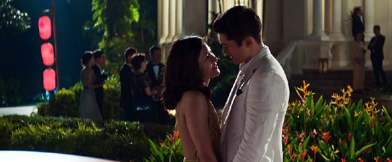 Rachel (Constance Wu) discovers her fiance, Nick (Henry Golding), comes from an incredibly wealthy family in Jon M. Chu’s Crazy Rich Asians, adapted from Kevin Kwan’s best-selling novel. 