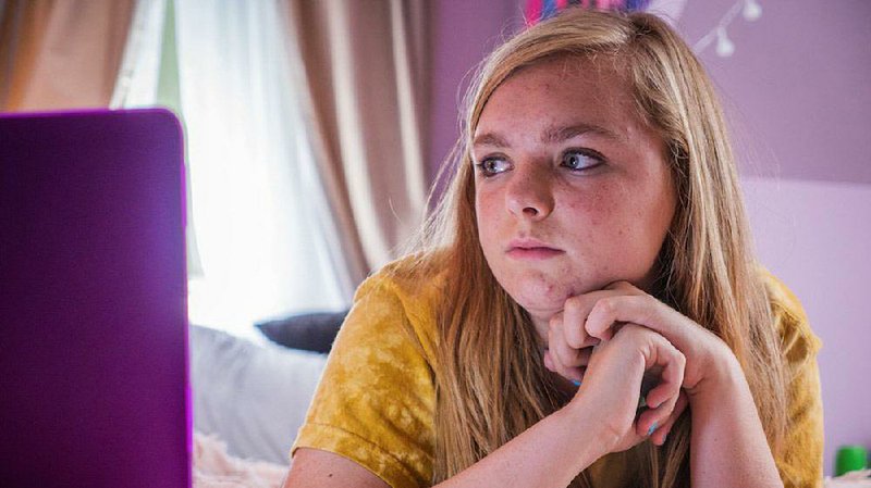 First-time actor Elsie Fisher stars in first-time director Bo Burnham’s Eighth Grade, which our critic says may be the best film of 2018 — so far.