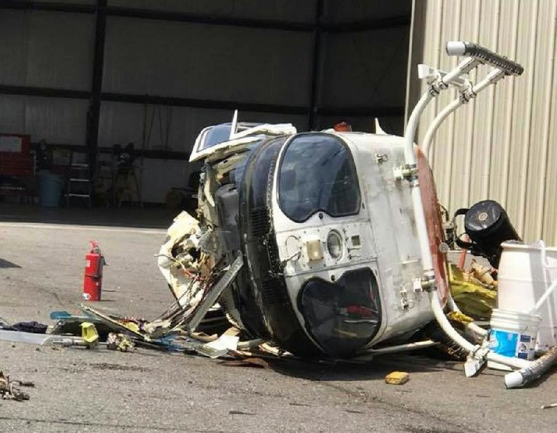 Wreckage of a Little Rock police helicopter sits Thursday at the department’s training facility after the aircraft tipped over during a test of a newly replaced battery.  
