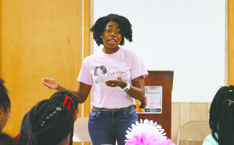 Herstory: Tabitha Reynolds lectures on womanhood and issues surrounding black women in today’s world during the “Herstory” workshop at New Bethel Baptist Church on Saturday.  The workshop was sponsored by Grandparents Against Bullying organization of El Dorado and provides a platform for young women to have peer group discussions on societal issues surrounding black/African American women while providing educational empowerment opportunities.