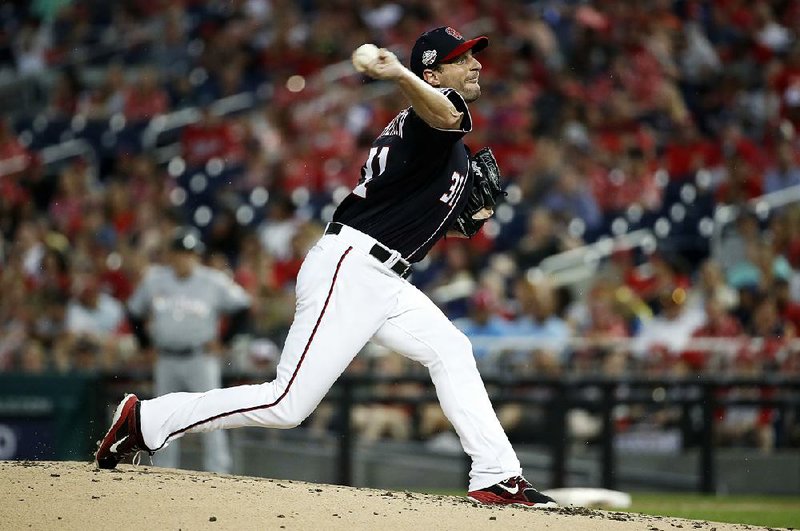 Washington Nationals starting pitcher Max Scherzer leads the National League in strikeouts (234) and wins (16) and is second in ERA (2.11). 