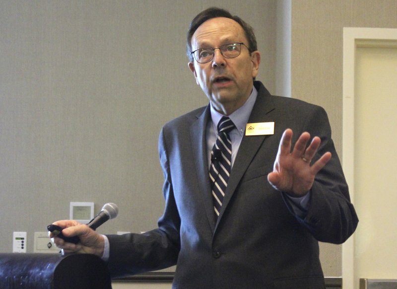 In this July 26, 2018 photo, Jerry Cox, the head of the Family Council Action Committee, speaks to a group of pastors at a breakfast meeting in Little Rock, Arkansas. Cox spoke about a proposed &quot;tort reform&quot; measure appearing on Arkansas' ballot in November. Cox's group is rallying churches against the proposal, which would impose new limits on damages awarded in lawsuits. (AP Photo/Andrew Demillo)