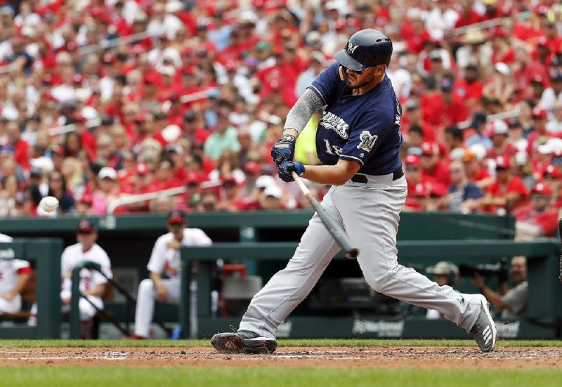Mike Moustakas’ two-run double in the third inning produced all of the runs the Milwaukee Brewers needed to defeat the St. Louis Cardinals 2-1 on Sunday in St. Louis.