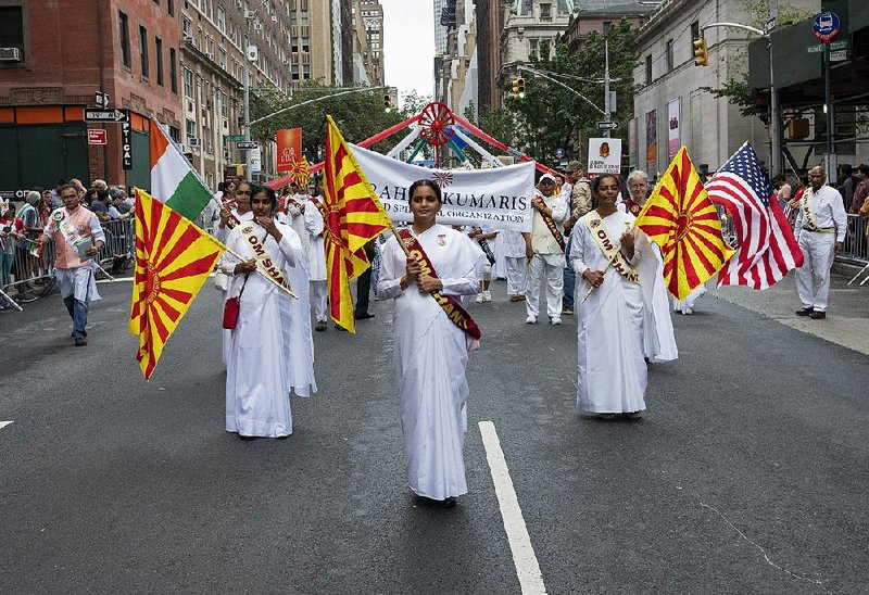 Participants march during the India Day Parade on Madison Avenue on Sunday in New York.