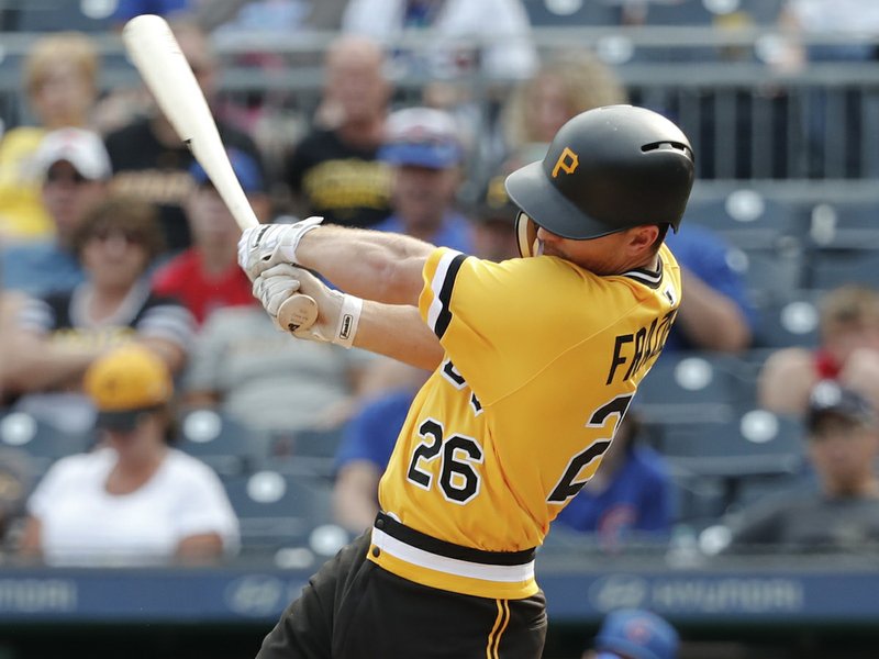Pittsburgh Pirates' Adam Frazier hits a walkoff winning home run in the 11th inning of a baseball game against the Chicago Cubs, Sunday, Aug. 19, 2018, in Pittsburgh. (AP Photo/Keith Srakocic)