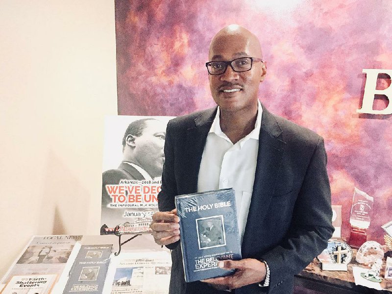 The Rev. Arthur L. Hunt Jr. shows a new Bible that commemorates civil-rights leader the Rev. Martin Luther King. The book will be released next week during the 55th anniversary of the March on Washington.