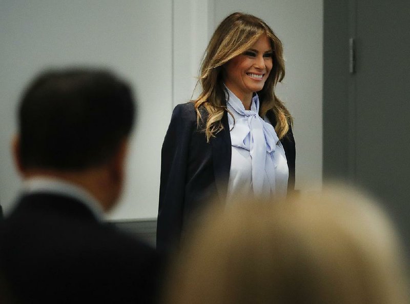 First lady Melania Trump smiles Monday as she helps open Federal Partners on Bullying Prevention, a government-sponsored event, in Rockville, Md.  