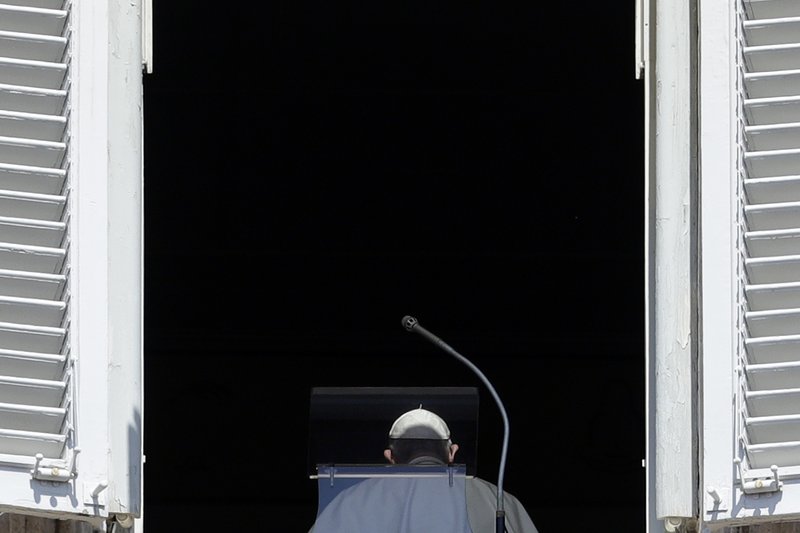 FILE - In this Sunday, Aug. 19, 2018 file photo, Pope Francis leaves his studio window overlooking St. Peter's Square at the end of the Angelus noon prayer at the Vatican. Pope Francis has issued a letter to Catholics around the world condemning the &quot;crime&quot; of priestly sexual abuse and cover-up and demanding accountability, in response to new revelations in the United States of decades of misconduct by the Catholic Church. (AP Photo/Gregorio Borgia, File)