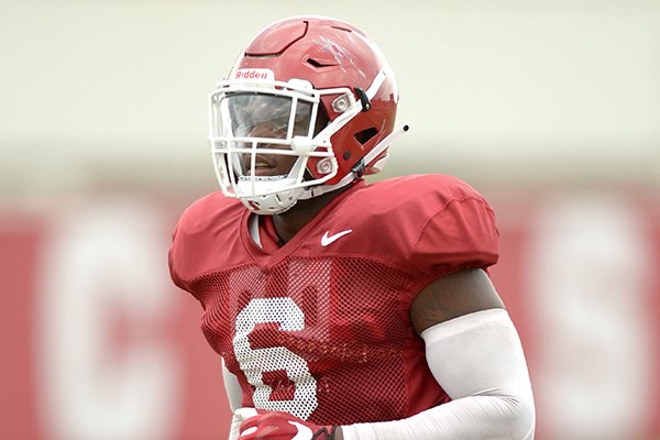 Arkansas defensive lineman Gabe Richardson participates in a drill Tuesday, Aug. 7, 2018, during practice at the university practice fields in Fayetteville. 
