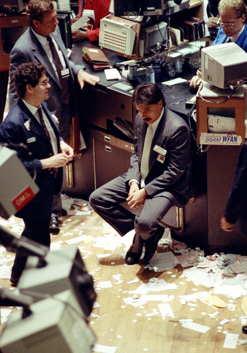  In this July 17, 1990, file photo a trader relaxes after the closing bell in the New York Stock Exchange. In 1990, the S&P 500 declined 19.92 percent from July 16 until Oct. 11. 