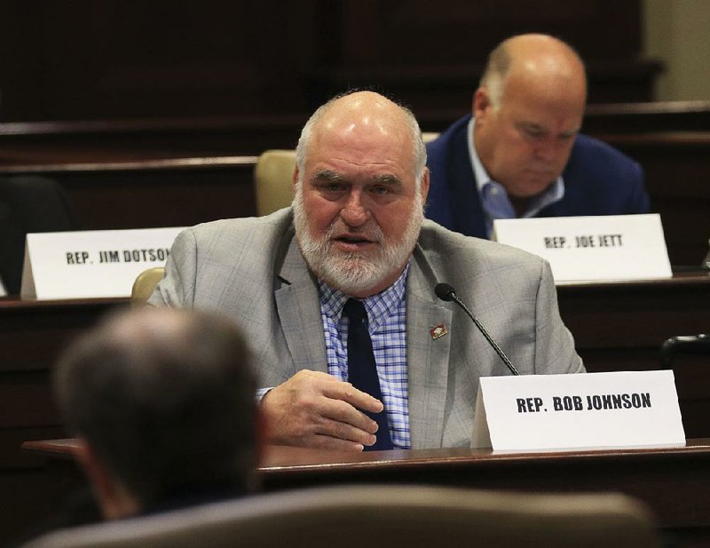 Rep. Bob Johnson, D-Jacksonville, a member of the Legislative Tax Reform and Relief Task Force, on Wednesday questions Paul Gehring, the acting revenue commissioner, as state officials unveil a plan to cut state income taxes. 