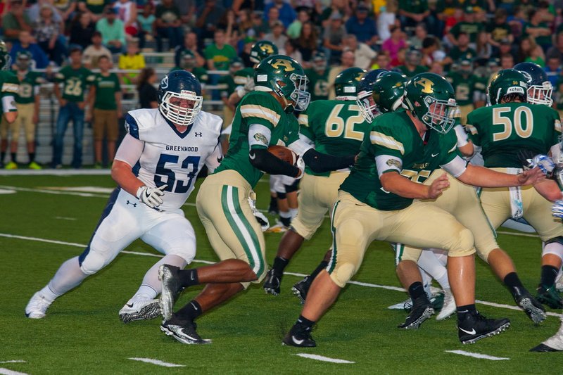 FILE PHOTO Alma senior Keegan Rosebeary runs the ball against Greenwood last season. Rosebeary will power the Airedales' offense in 2018, running behind an experienced offensive line that returns all five starters.