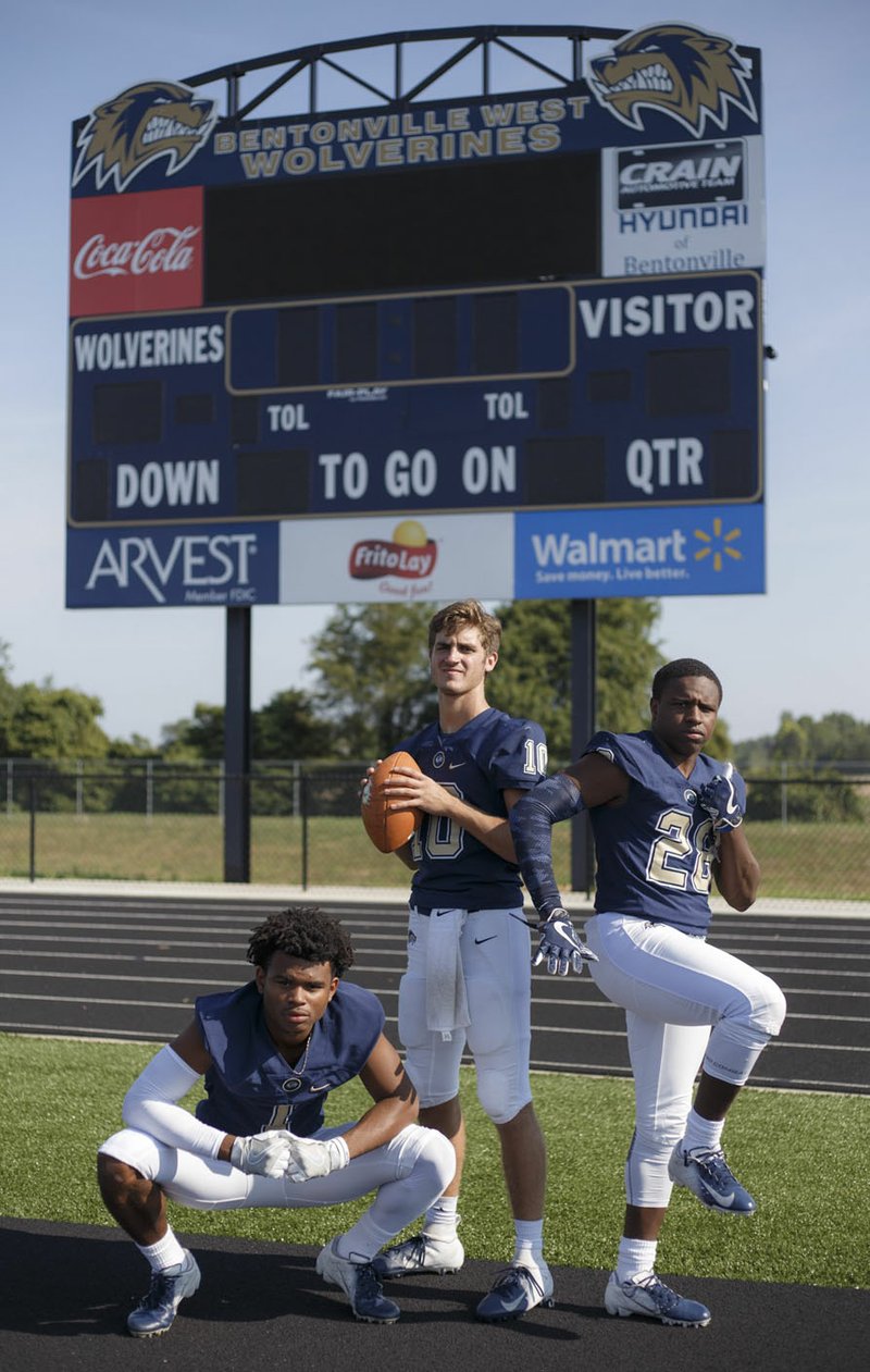 NWA Democrat-Gazette/CHARLIE KAIJO Jadon Jackson, Will Jarrett and Tyrese Smallwood (from left) pose for a portrait, Monday, July 23, 2018 at Bentonville West High School in Centerton.