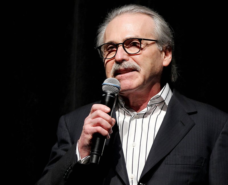 In this Jan. 31, 2014 photo, David Pecker, Chairman and CEO of American Media, addresses those attending the Shape & Men's Fitness Super Bowl Party in New York. The Aug. 21, 2018 plea deal reached by Donald Trump's former attorney Michael Cohen has laid bare a relationship between the president and Pecker, whose company publishes the National Enquirer. 