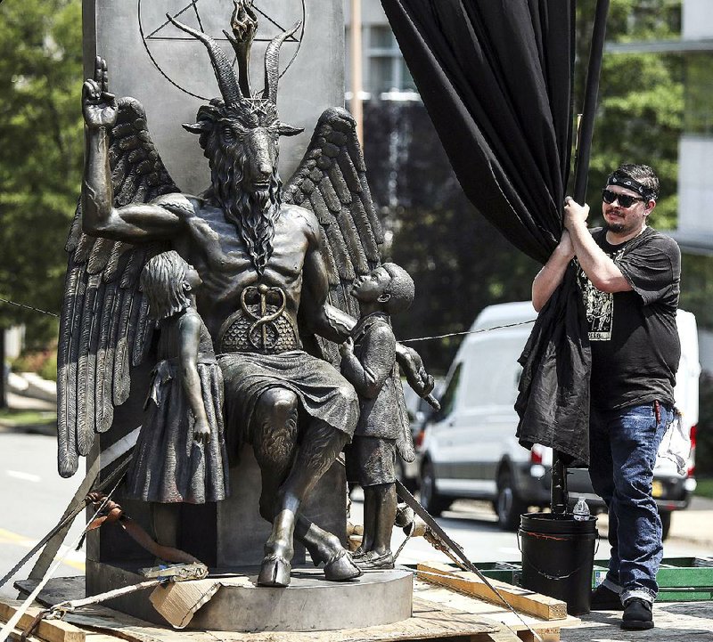 The statue of Baphomet that will stand on the state Capitol grounds was unveiled last week. However, before ground can be broken, a small matter of the First Amendment must be decided in federal court. Fayetteville-born Otus the Head Cat’s award-winning column of humorous fabrication appears every Saturday.
