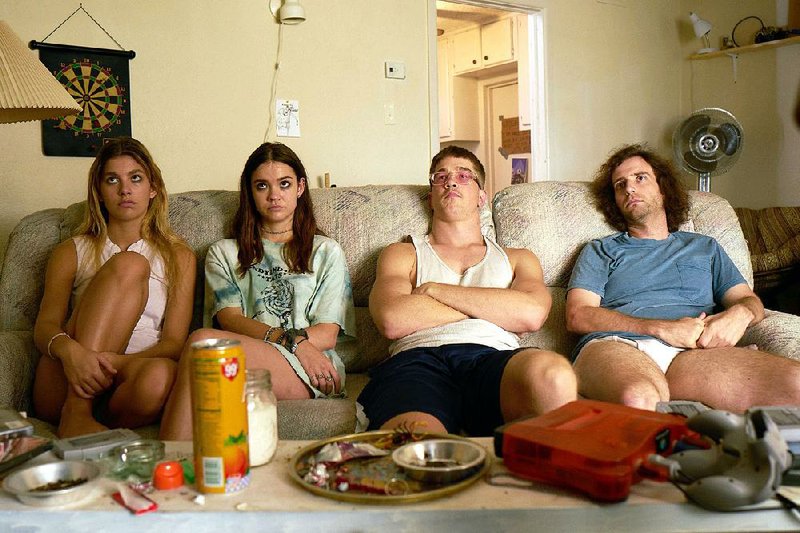Jessie (Camila Morrone) and Angela (Maia Mitchell) chill with their feckless roommates Dustin (Joel Allen) and Brandon (Kyle Mooney) in Augustine Frizzell’s semi-autobiographic paean to the intimacies of female friendship Never Goin’ Back. 