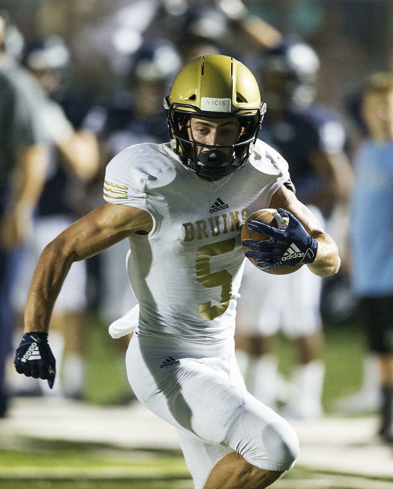 NWA Democrat-Gazette/BEN GOFF @NWABENGOFF
John David White, Pulaski Academy wide receiver, runs in a touchdown Friday, Aug. 24, 2018, during the game against Springdale Har-Ber at Wildcat Stadium in Springdale. 