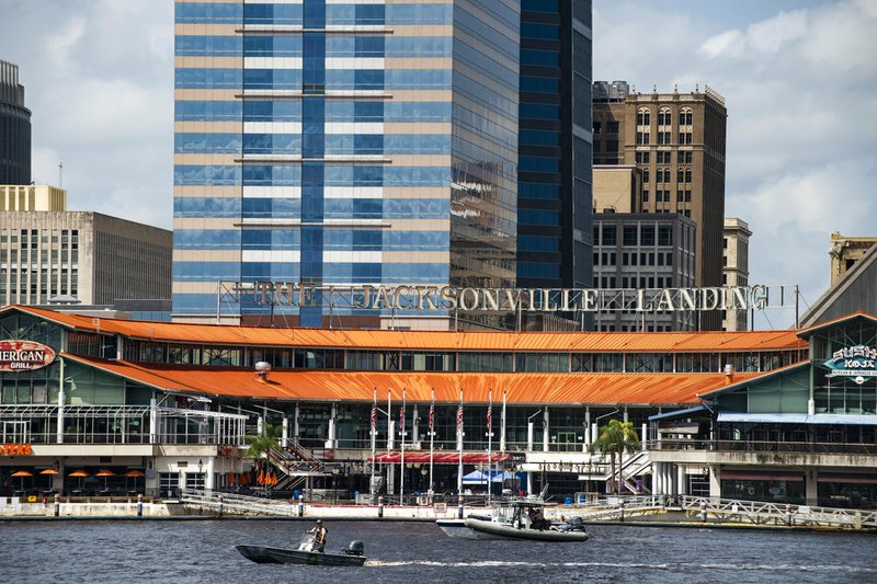 The coast guard patrols the St John's river outside of the Jacksonville Landing in Jacksonville, Fla., Sunday, Aug. 26, 2018. Florida authorities are reporting multiple fatalities after a mass shooting at the riverfront mall in Jacksonville that was hosting a video game tournament. 

