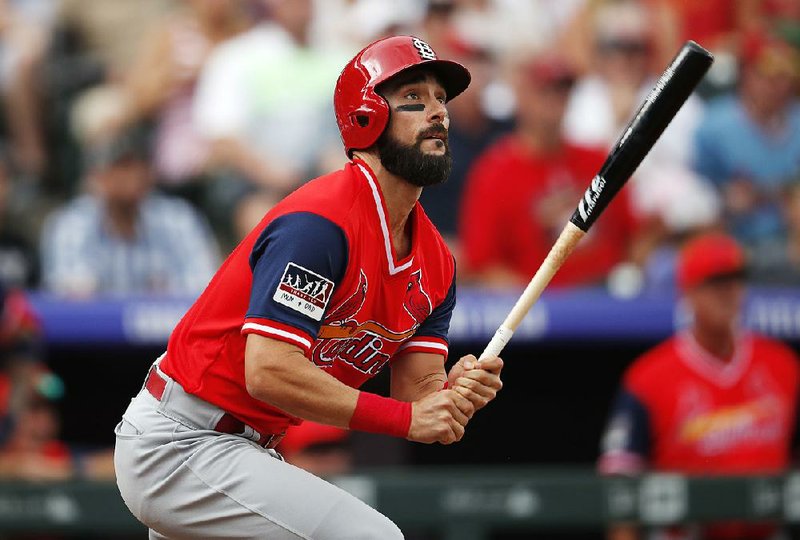 Matt Carpenter tied a ma- jor-league record with four dou- bles in a nine-inning game as the Cardinals beat the Colorado Rockies 12-3 on Sunday, taking two of three in a series be- tween National League playoff contenders. 