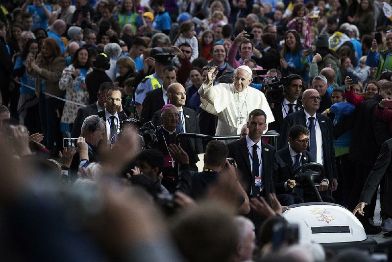 Pope Francis arrives Saturday at Croke Park stadium in Dublin for a World Meeting of Families event.