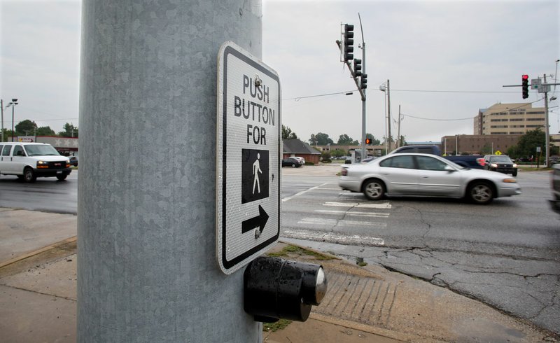 NWA Democrat-Gazette/DAVID GOTTSCHALK The intersection of Thompson Street and Maple Avenue is seen Thursday in Springdale.