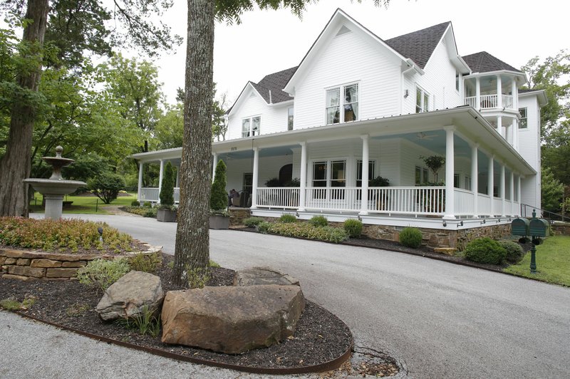 File photo/NWA Democrat-Gazette/DAVID GOTTSCHALK Pratt Place Inn, on Markham Hill in Fayetteville, is part of a plan from Specialized Real Estate for development for Markham Hill . Plans include cabins, restaurant, commercial and event space, a neighborhood, hotel-style building, preservation area and expansion or repurposing of buildings.