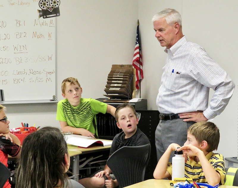 Westside Eagle Observer/RANDY MOLL U.S. Congressman Steve Womack visits with Gentry fourth grade students in their new classroom facility on Aug. 22. Womack toured the facility and spoke with students, teachers and staff members.