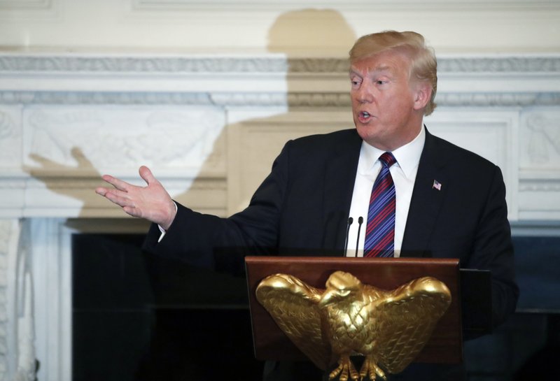 President Donald Trump speaks during a dinner for evangelical leaders in the State Dining Room of the White House, Monday, Aug. 27, 2018, in Washington. (AP Photo/Alex Brandon)