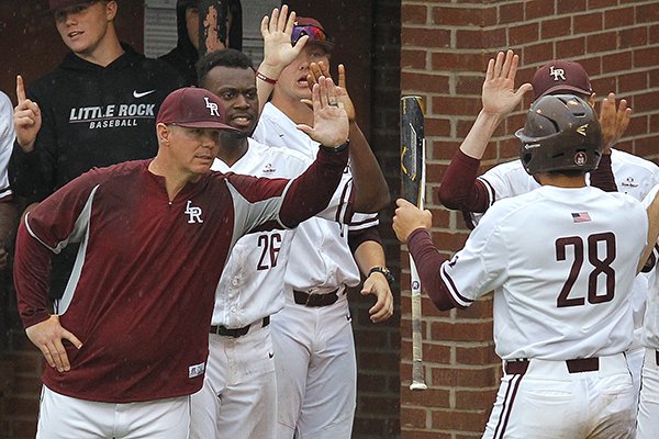 UALR head coach Chris Curry (left) congratulates Nick Perez after he scored in the bottom of the third inning during the Trojans' game against South Alabama on Friday, May 4, 2018, at Gary Hogan Field in Little Rock.