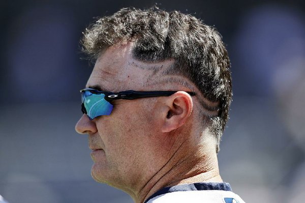 Servais keeps word with flashy hairdo after Diaz's 50th save 