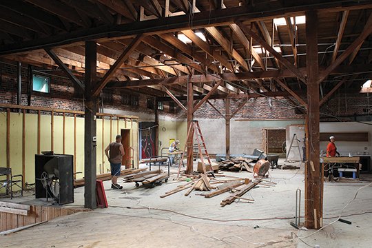 The Sentinel-Record/Richard Rasmussen DISTILLERY: Construction continues at the former Old Country Store building at 455 Broadway St. Owners Danny and Mary Bradley are renovating the building and plan to open Crystal Ridge Distillery in March 2019.