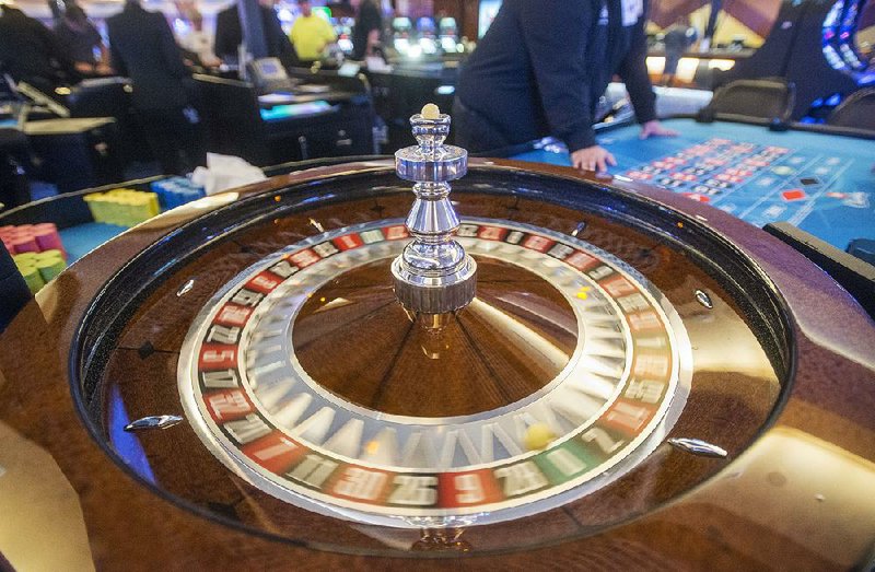 A roulette wheel spins at Cherokee Casino & Hotel in West Siloam Springs, Okla., on August 23. Some Oklahoma casinos have been granted permission to install “ball and dice” games including roulette and craps.