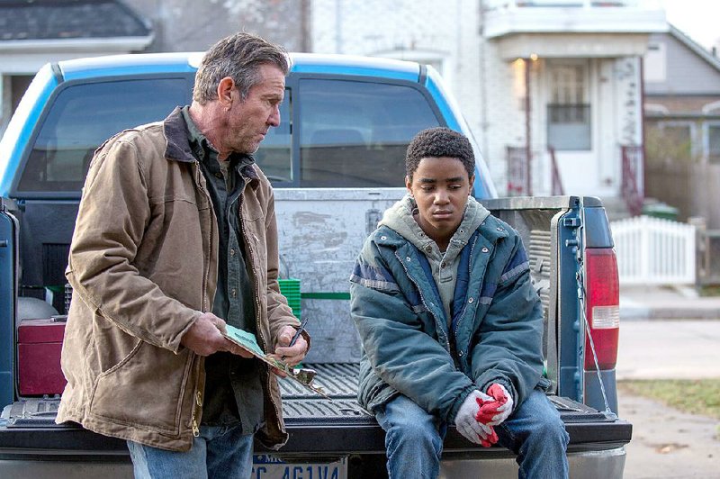 Hal (Dennis Quaid) adopts a tough love approach to dealing with his adopted son Eli (newcomer Myles Truitt) in the genre-blending sci-fi film Kin. 