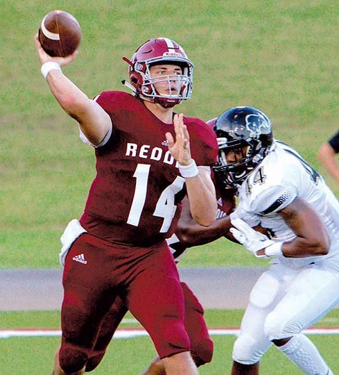 Submitted photo STARTING QB: Henderson State junior quarterback Richard Stammetti (14) throws a pass Thursday during the Reddies' 41-17 loss to No. 7 Harding at Carpenter-Haygood Stadium at Ruggles Field in Arkadelphia. Photo by Steve Fellers, courtesy of Henderson State Athletic Communications.