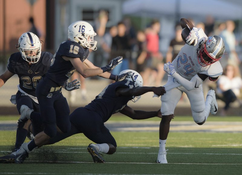 NWA Democrat-Gazette/CHARLIE KAIJO Southside High School running back Ricardo Savoy (24) runs the ball during a football game Friday at Bentonville West High School in Centerton.