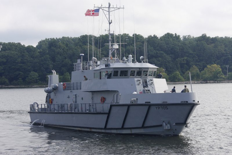 In this Tuesday, July 31, 2018, photo, a Yard Patrol Craft leaves the U.S. Naval Academy on a training trip in Annapolis, Md. For the first time in history of the navigation training program at the academy, about 80 ROTC students participated in YP training this summer as part of a pilot program exploring ways to expand navigation training for future U.S. Navy officers after high-profile accidents last year. (AP Photo/Brian Witte)
