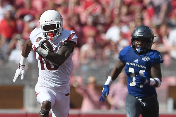 Razorback wide receiver Jordan Jones gains yards after catching a pass in the second quarter against Eastern Illinois. Saturday Sept. 1, 2018 at Donald W. Reynolds Razorback Stadium in Fayetteville.