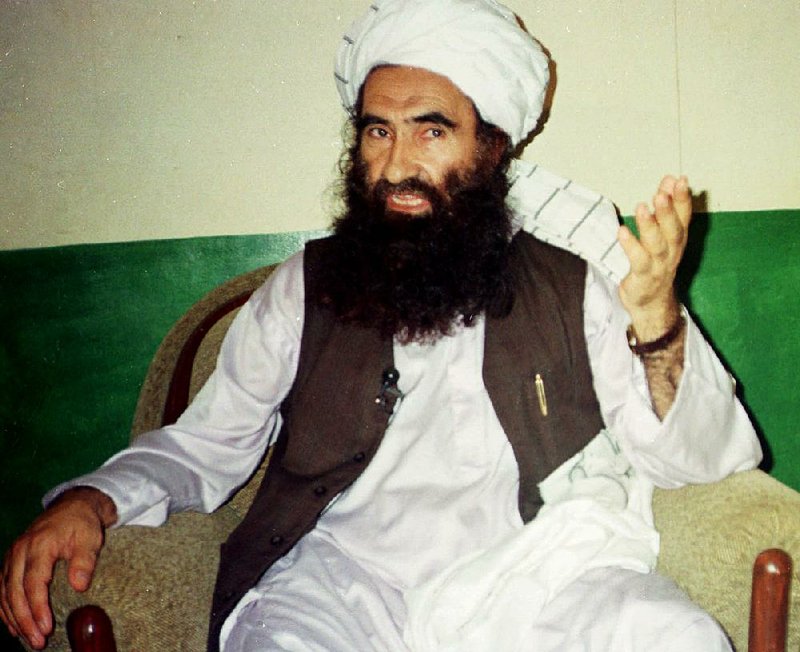 In this Aug. 22, 1998, file photo,Mawlavi Jalaluddin Haqqani,, founder of the militant group the Haqqani network, speaks during an interview in Miram Shah, Pakistan. 