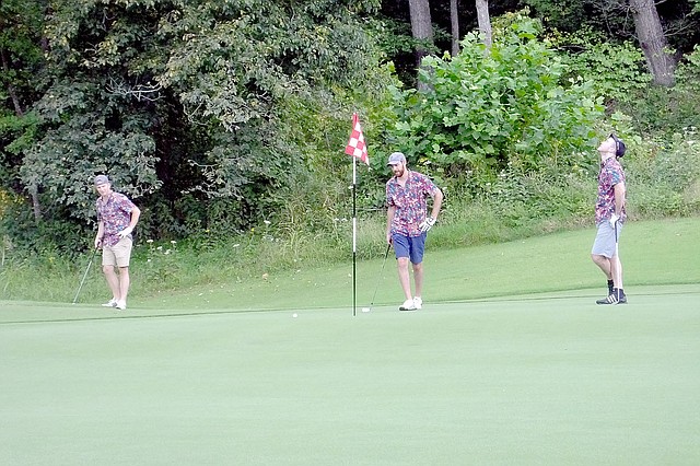 Lynn Atkins/The Weekly Vista Adam Goldstein, Chris Weddige and James Webb were part of a group of eight friends who visit Bella Vista once a year to play golf. They didn't realize their favorite course had been closed, but they noticed the greens were in very good condition.