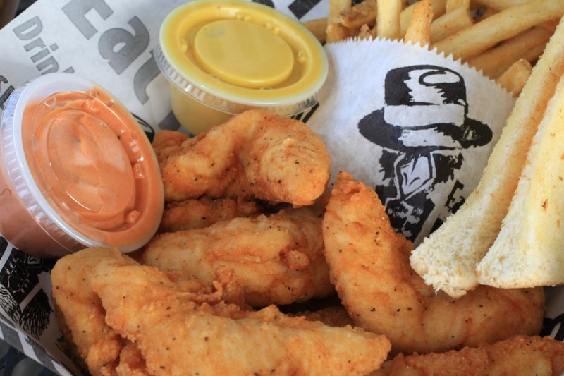 Arkansas Democrat-Gazette/STATON BREIDENTHAL 12/21/10
Chick's plate and fried mushrooms from Slim Chickens in Conway.