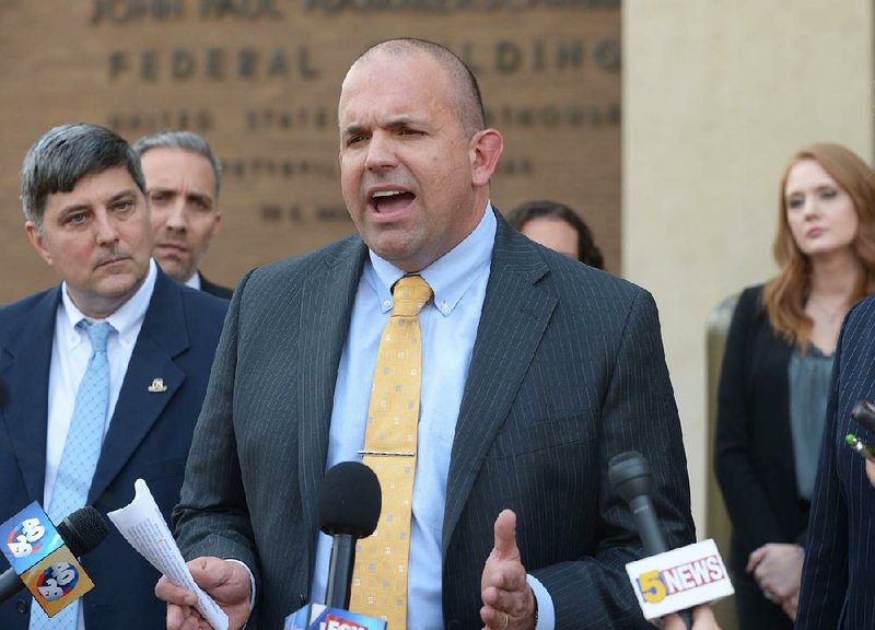 U.S. Attorney Duane “Dak” Kees discusses Jon Woods’ sentencing Wednesday in Fayetteville. Kees testified that Woods “weaponized” his charisma and trust in committing fraud. 