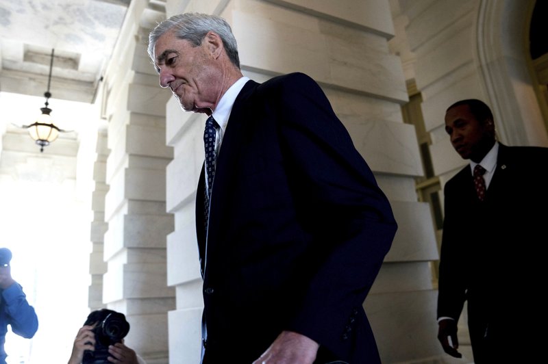 In this June 21, 2017, file photo, former FBI Director Robert Mueller, the special counsel probing Russian interference in the 2016 election, departs Capitol Hill following a closed door meeting in Washington.