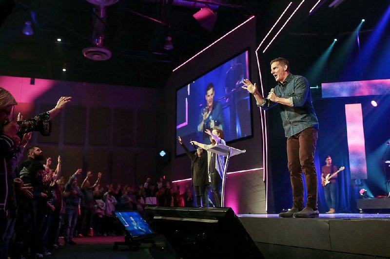 Craig Groeschel, founder and senior pastor of Life Church, leads a service in Oklahoma City.