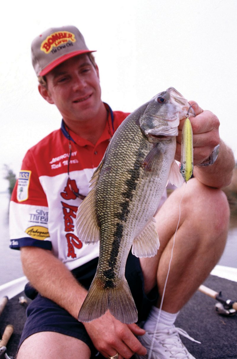 Bass pro Rick Morris of Lake Gaston, Va., shows off a nice Arkansas River spotted bass, or Kentucky, caught while fishing with Keith Sutton near Pendleton.