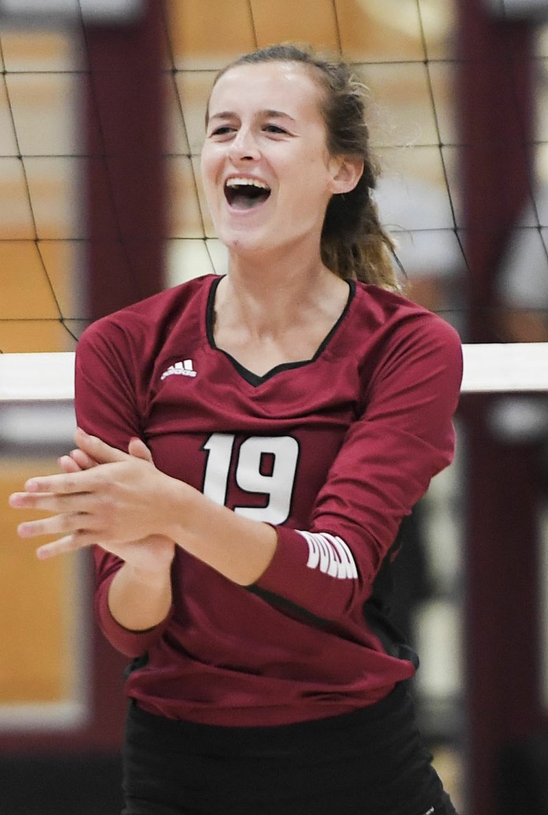 NWA Democrat-Gazette/CHARLIE KAIJO Springdale High School Lauren Bench (19) reacts after a score during a volleyball game, Thursday, September 6, 2018 at Springdale High School in Springdale.