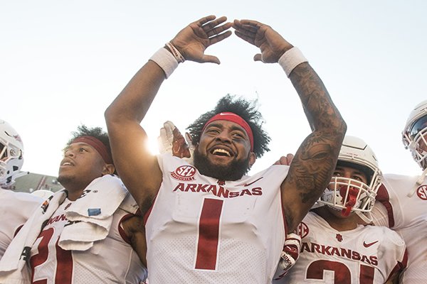 Arkansas players celebrate after defeating Eastern Illinois Saturday, Sept. 1, 2018, at Razorback Stadium in Fayetteville.