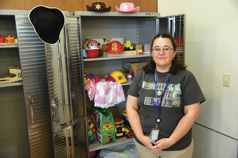 Terry Nunnery, youth programmer at the Esther D. Nixon Library in Jacksonville, shows some of the new toys that will be available for checkout beginning Friday. Liza Wilson of Austin, Texas, whose parents live in Jacksonville, donated the new toys in memory of her late grandmother, Ruth Nita Nixon Wilson, for whom a room in the library is named. The program is called Gran Gran’s Toy Library, and two toys per child may be checked out for up to two weeks.