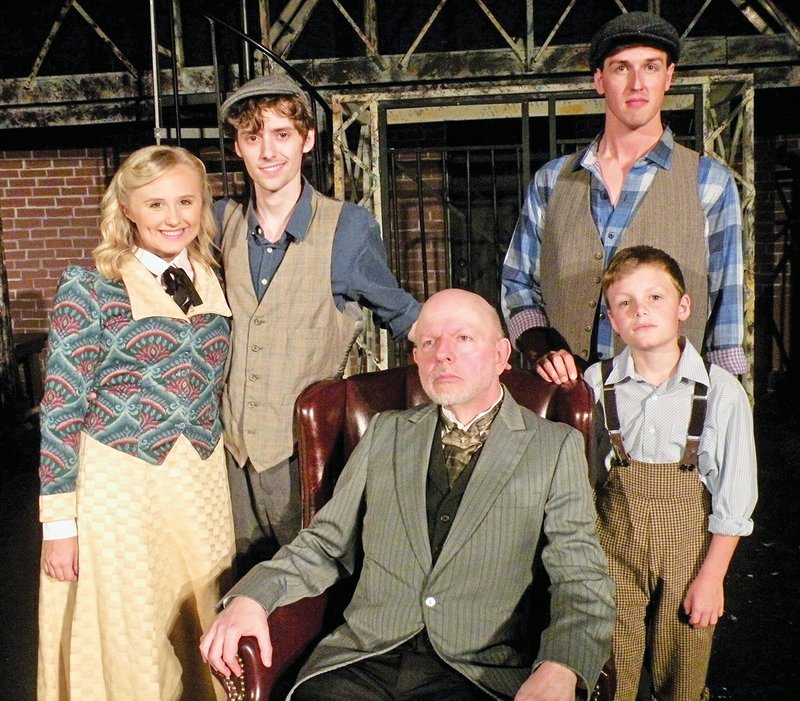 Appearing in the Young Players’ upcoming production of Disney’s Newsies the Musical are, from left, Makayla Shipe, who appears as Katherine Plumber, the young journalist; Ethan Patterson as Jack Kelley, leader of the Manhattan newsies; John C. Thompson, seated, as Joseph Pulitzer; Mark A. Burbank as the newsie Davey, back; and John Isaac Small as Les, Davey’s younger brother, who has also joined the newsies.